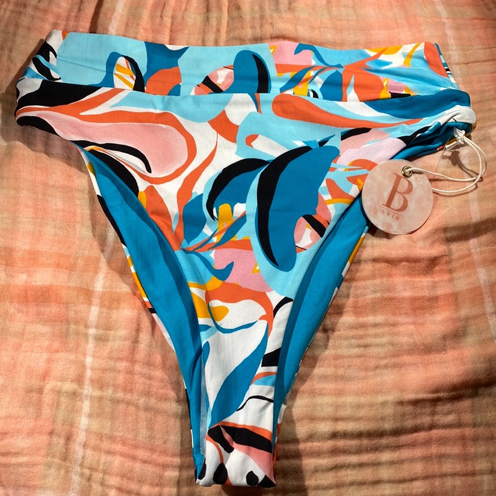 NWT B Swim Bikini bottoms. Size small. Multicolored. Fully lined.